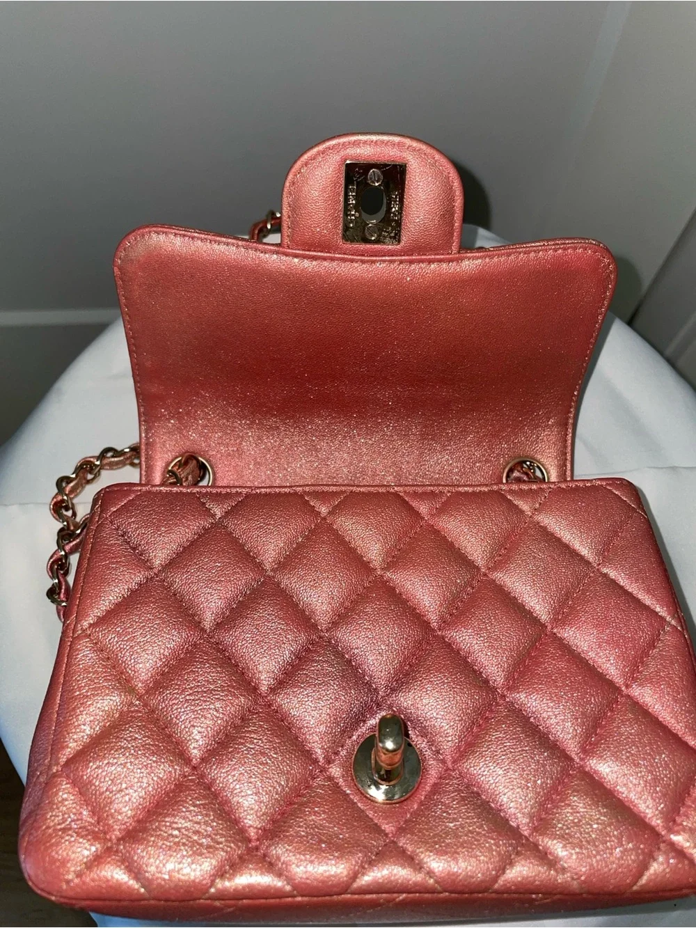 CHANEL Quilted Mini Flap Bag in Metallic Rose
